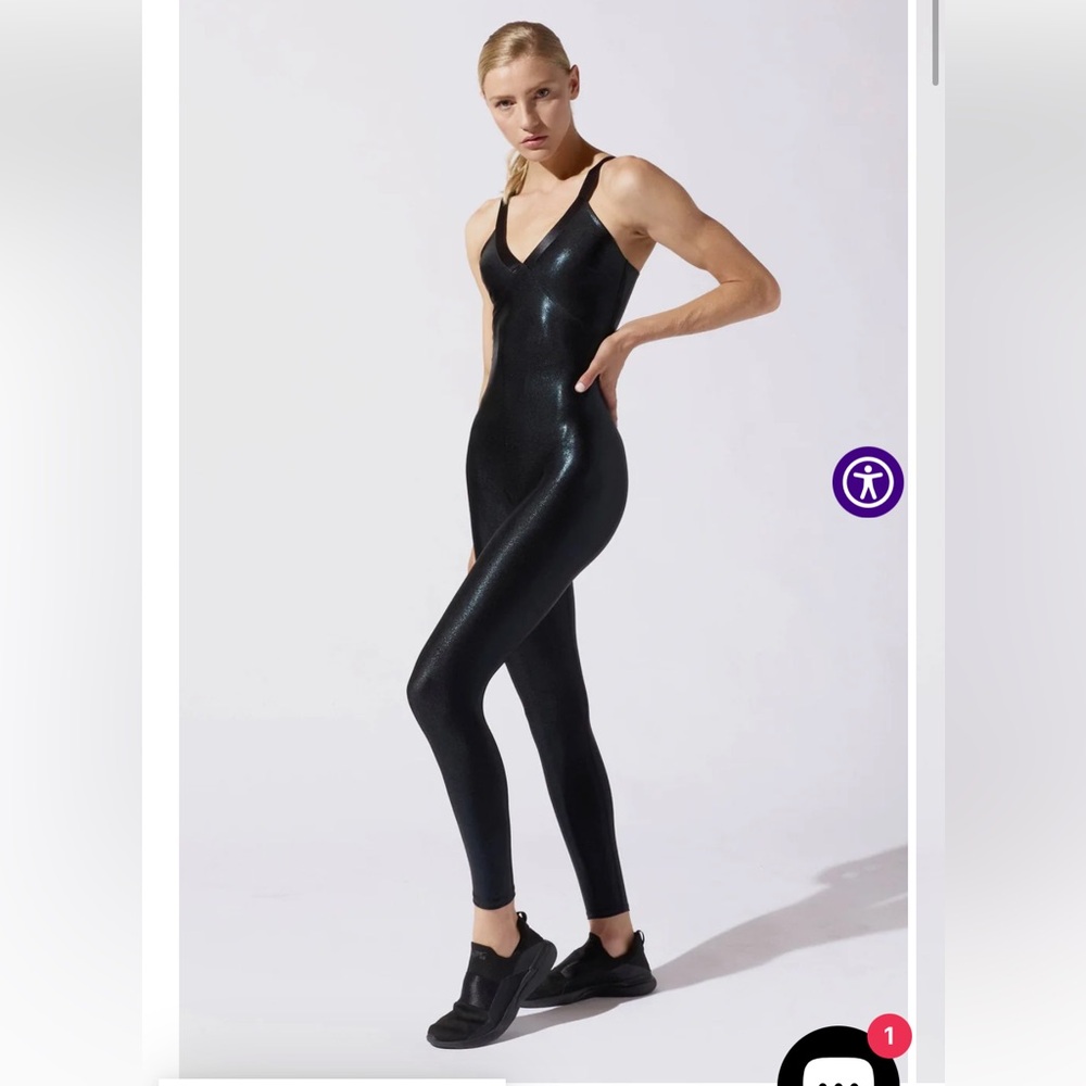 Heroine Sport Racing jumpsuit in 24K Metallic Gold with Black Straps. NWT. M